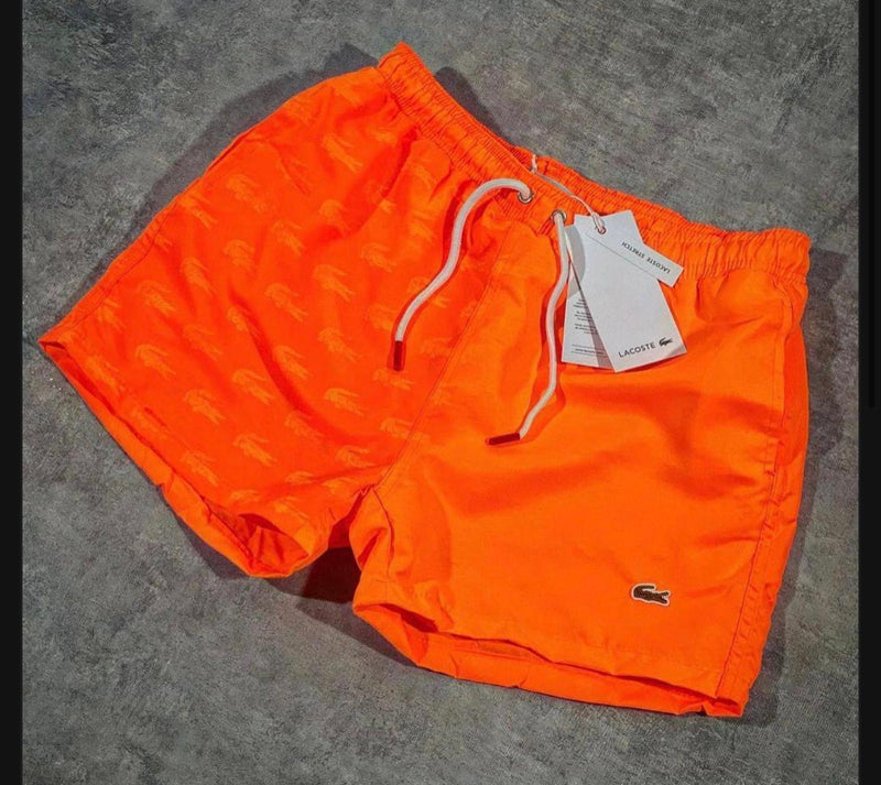Calções de praia laranja Lacoste🐊